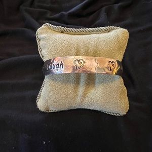 Silver colored bracelet